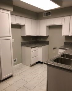 Elegant cabinet design paired with durable tile flooring in Joseph Rodriguez’s Santa Clarita kitchen renovation.
