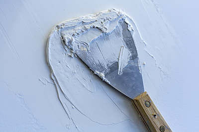 Considerations in painting over drywall defects